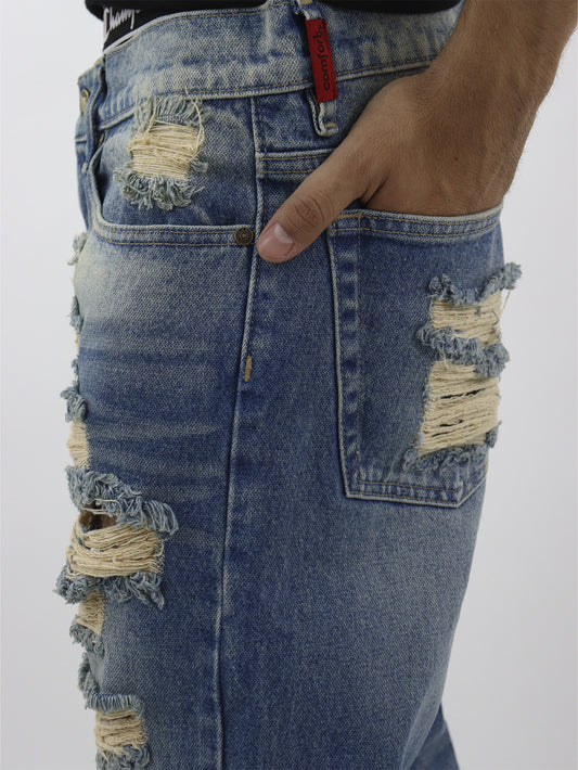 Jeans regular azul con tinta