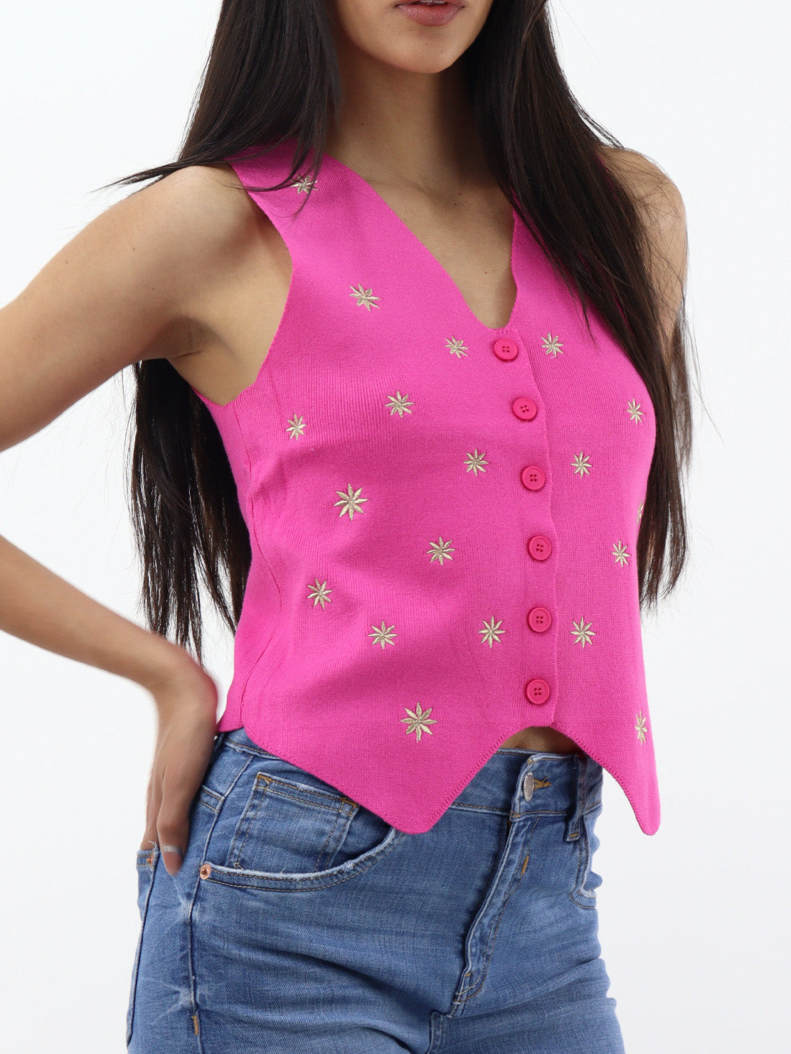 Chaleco fucsia en cuello V con detalle floral