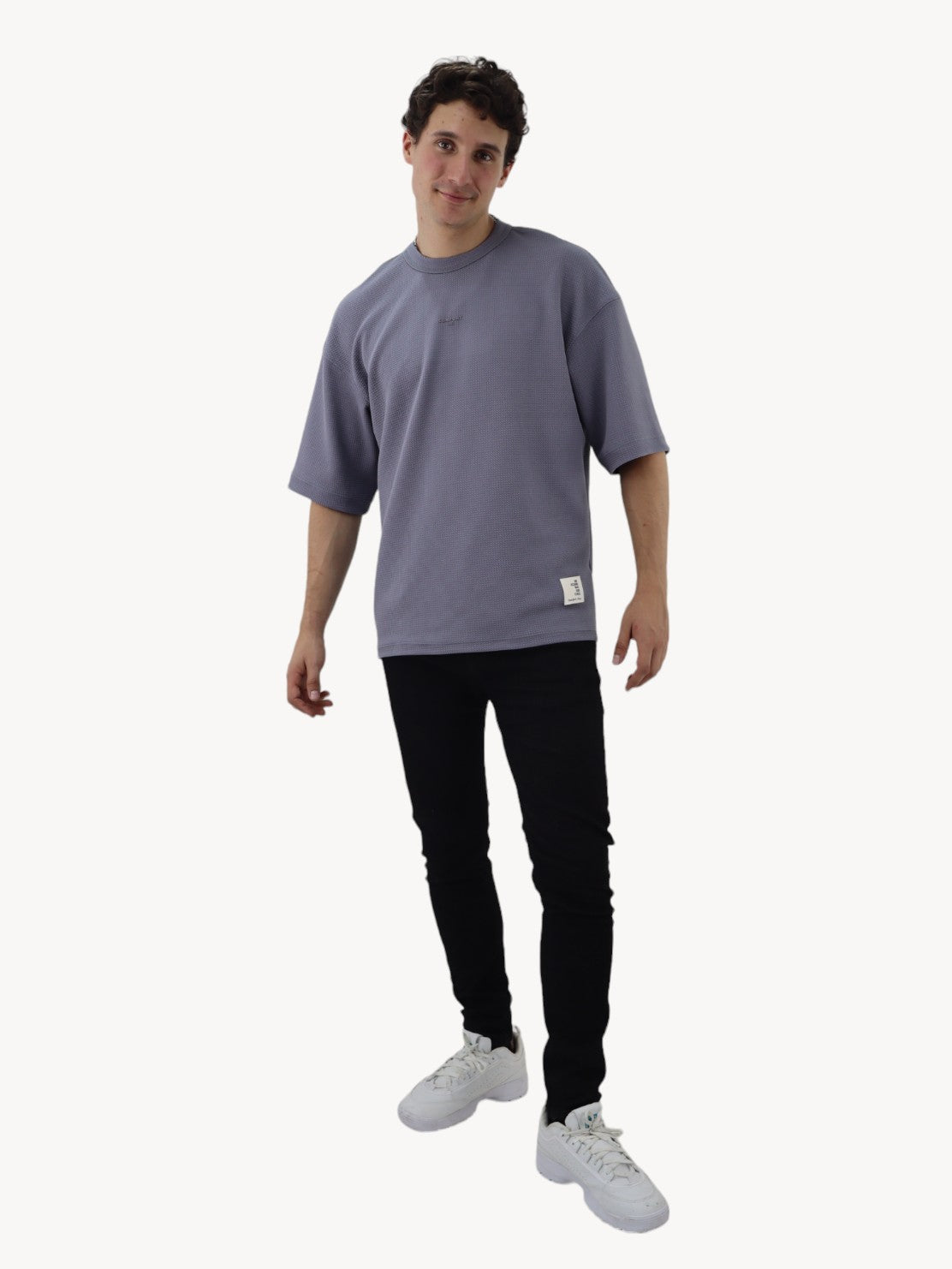 Jeans skinny negro jaspeado