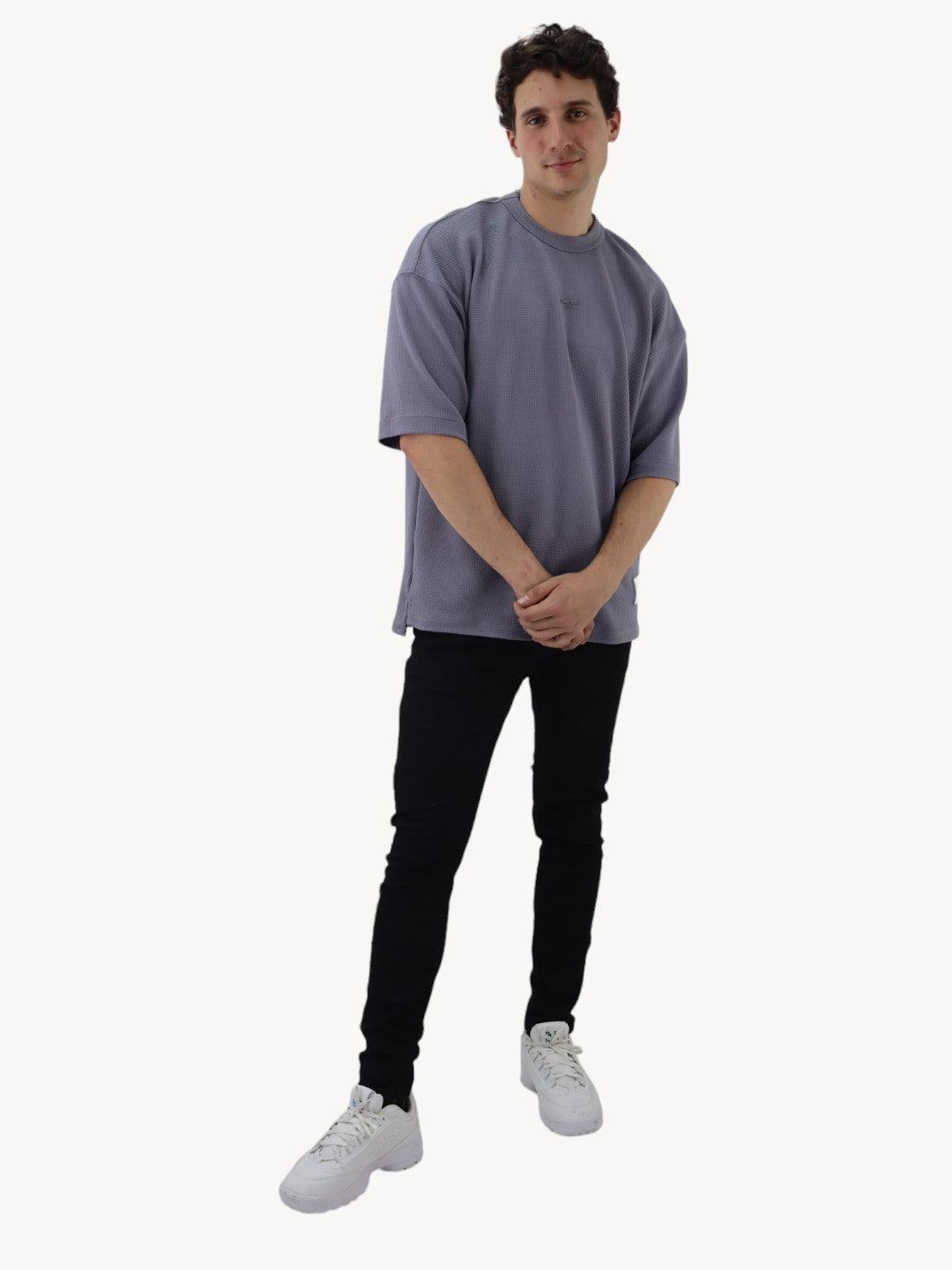 Jeans skinny negro jaspeado