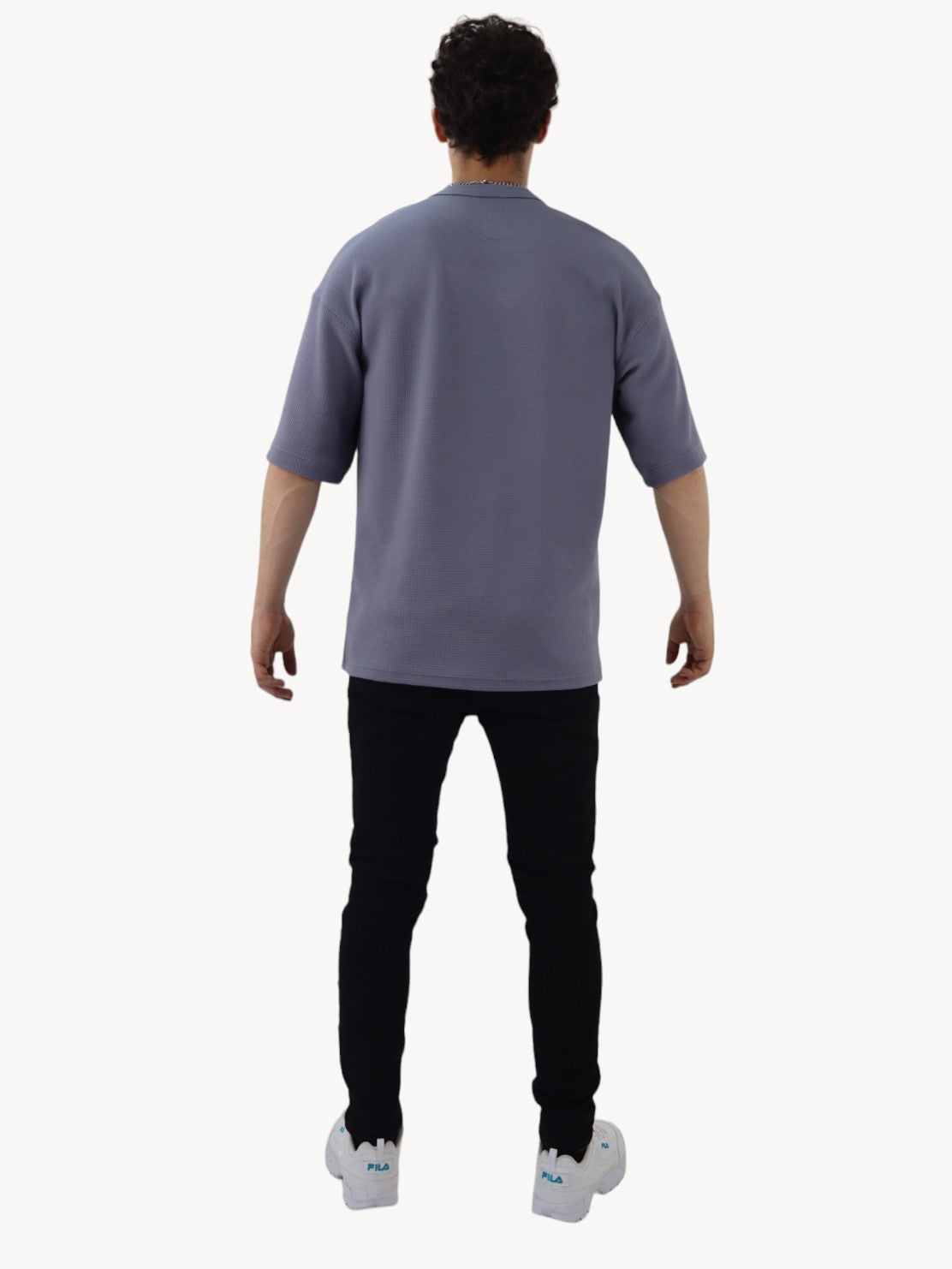 Jeans skinny negro jaspeado