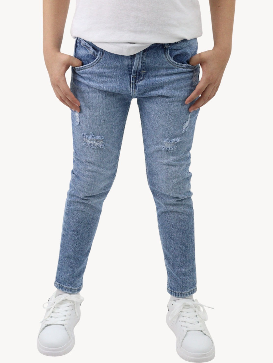 Vaquero slim fit con destrucción