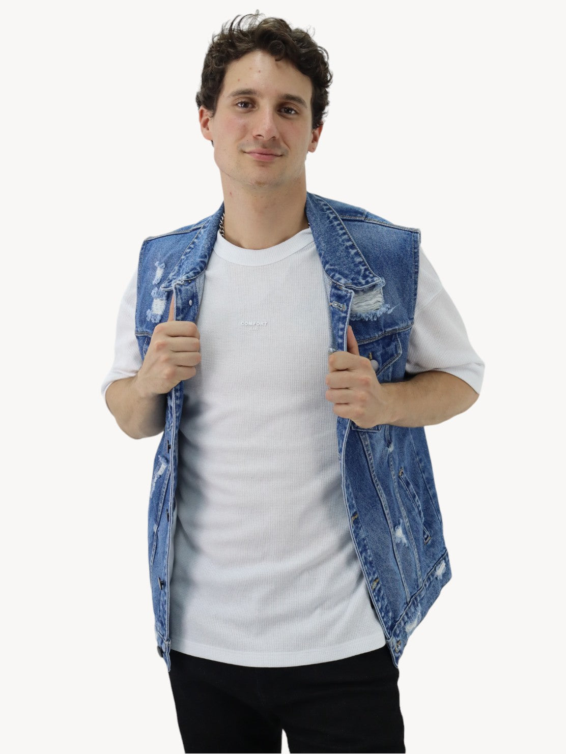 Chaleco denim de color azul oscuro con destrucción