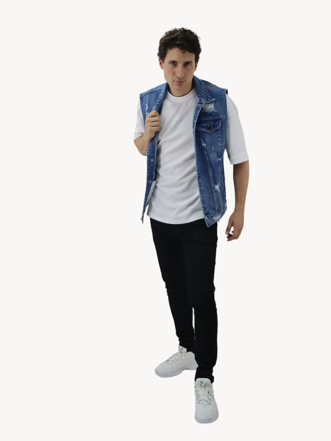 Chaleco denim de color azul oscuro con destrucción