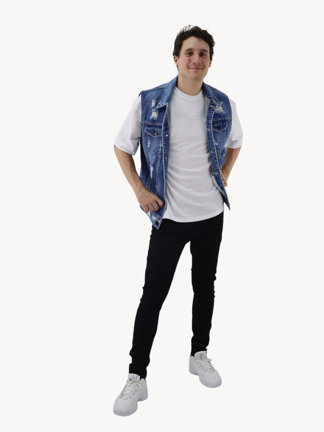 Chaleco denim de color azul oscuro con destrucción