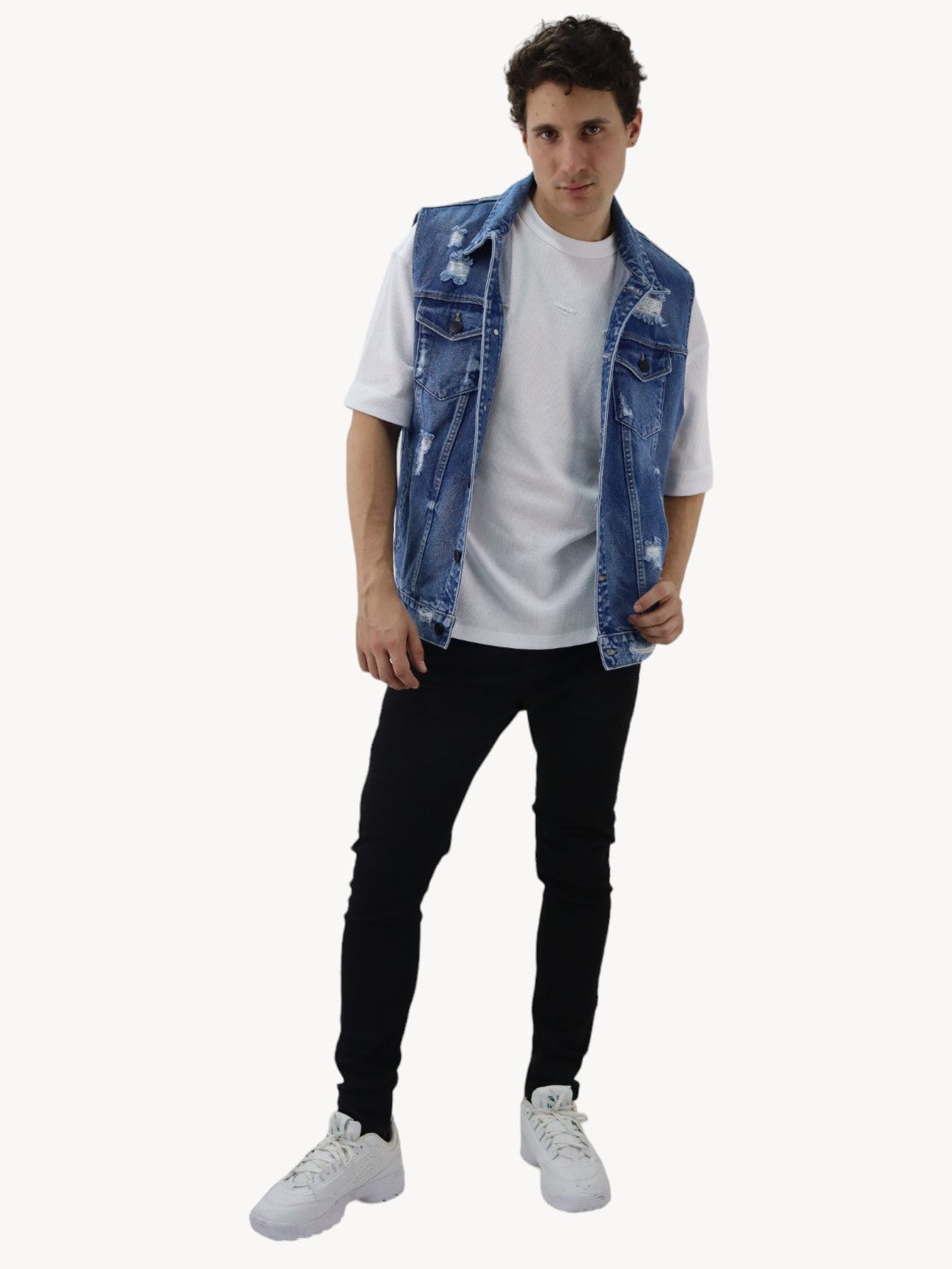 Chaleco denim de color azul oscuro con destrucción