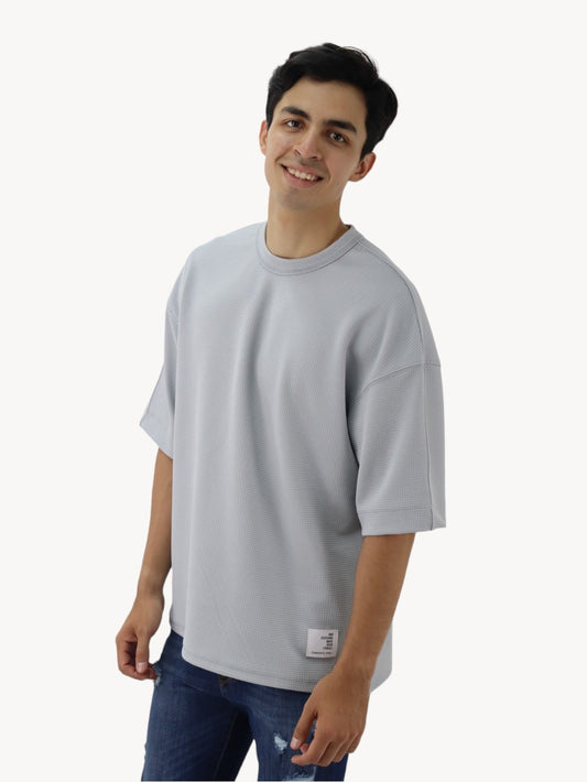 Playera oversize manga corta de color gris claro