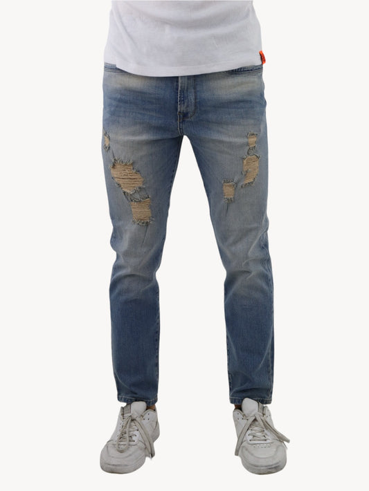 Jeans estilo slim/skinny deslavado con destrucción
