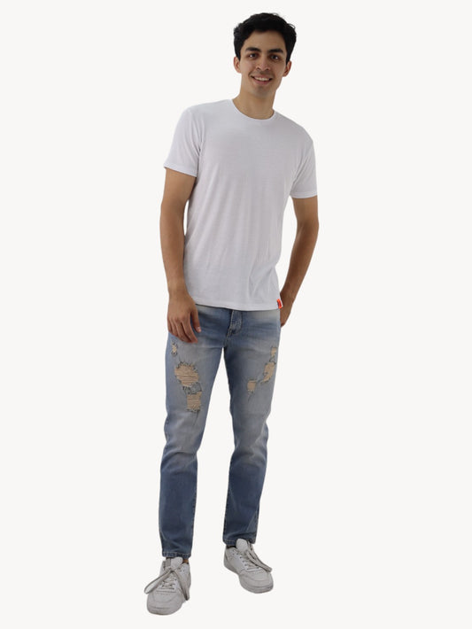 Jeans estilo slim/skinny deslavado con destrucción