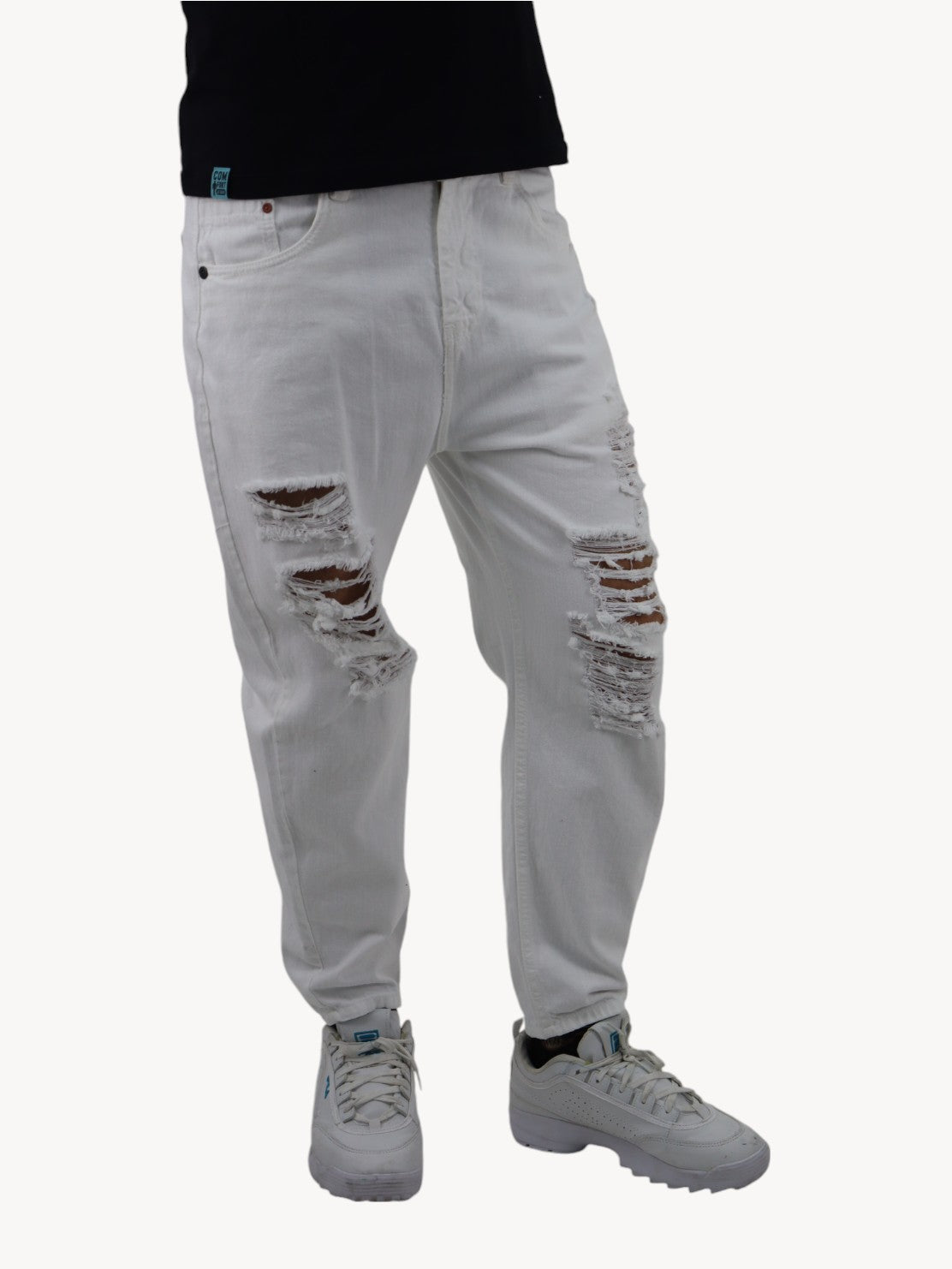 Jeans loose blanco con destrucción