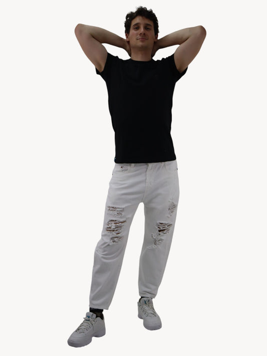 Jeans loose blanco con destrucción