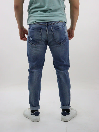 Jeans skinny de color azul medio con destrucción (NUEVA TEMPORADA)