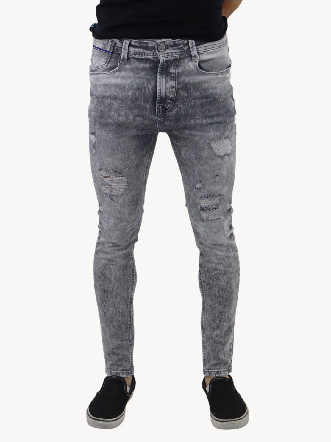 Jeans skinny de color gris con snow