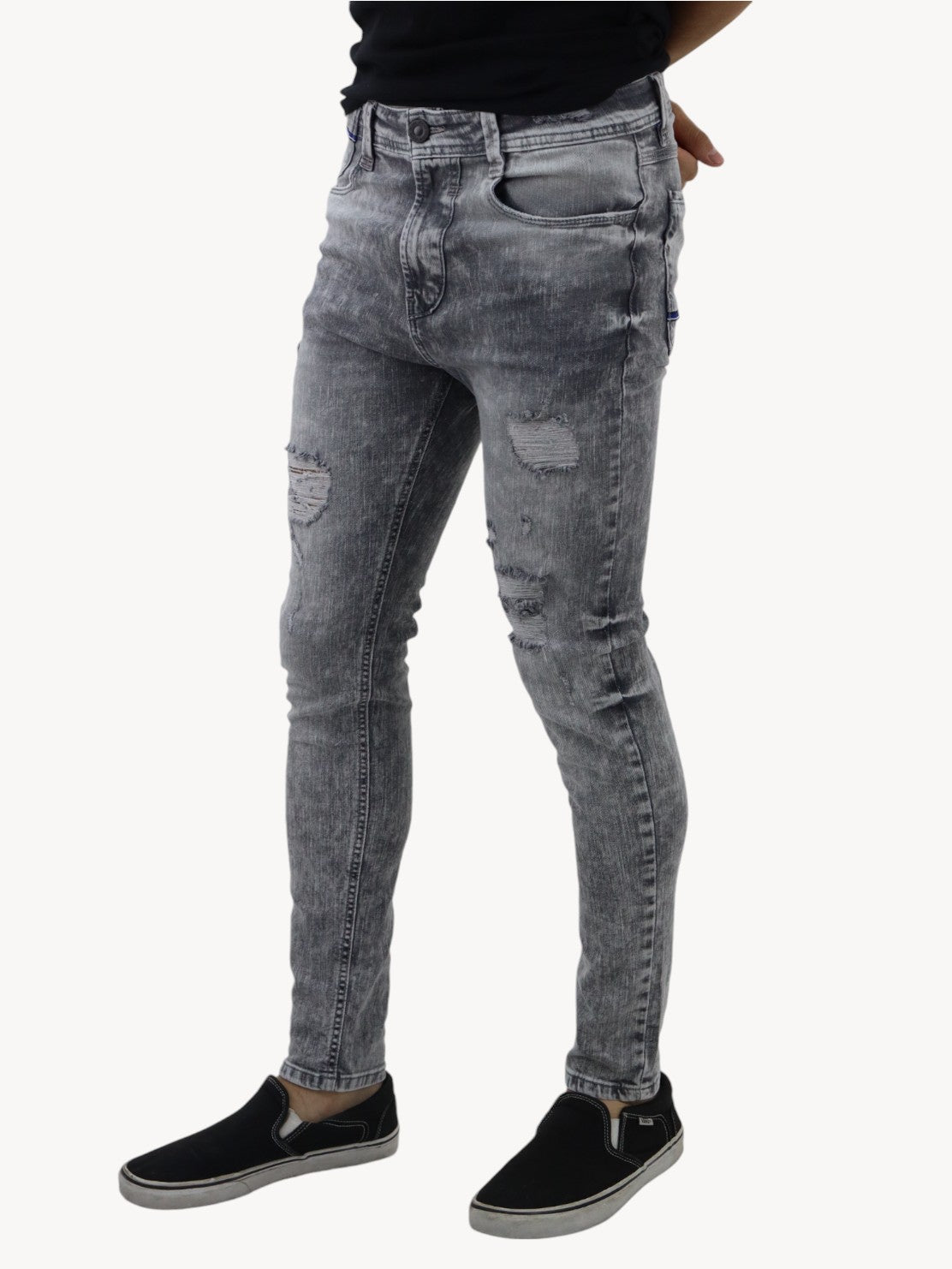 Jeans skinny de color gris con snow