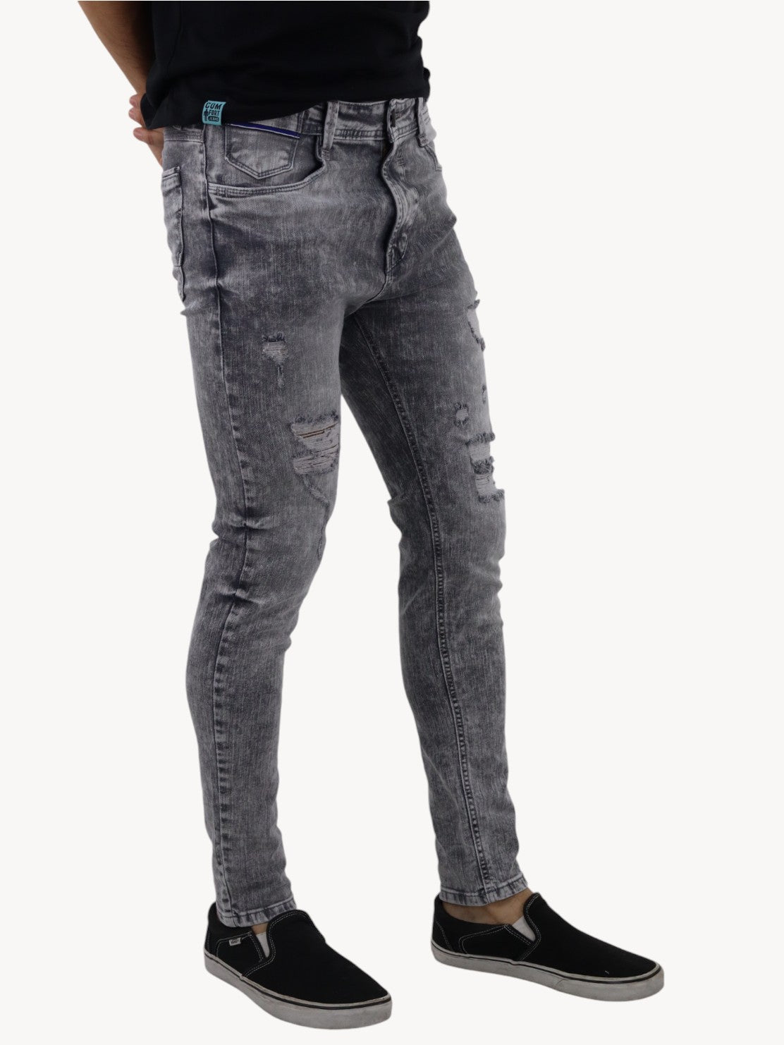 Jeans skinny de color gris con snow
