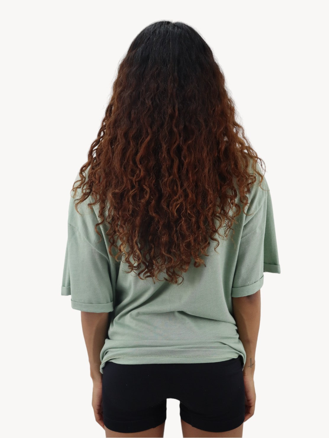 Playera oversize de color verde con estampado