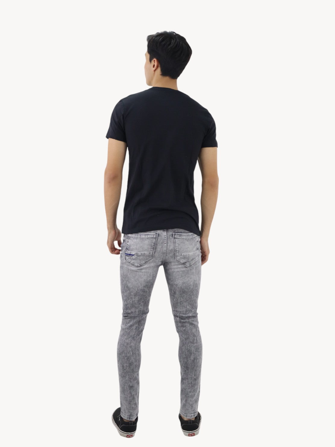 Jeans skinny de color gris con snow
