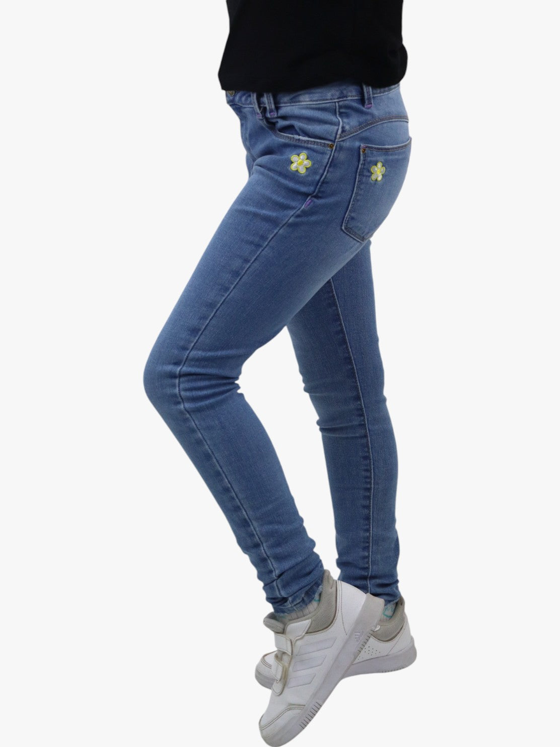 Jeans skinny azul claro con bordado floral