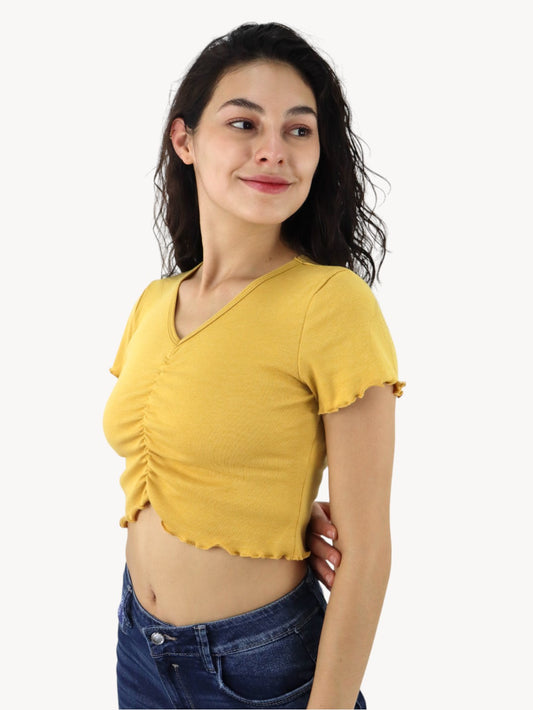 Playera fruncida de color amarillo mostaza