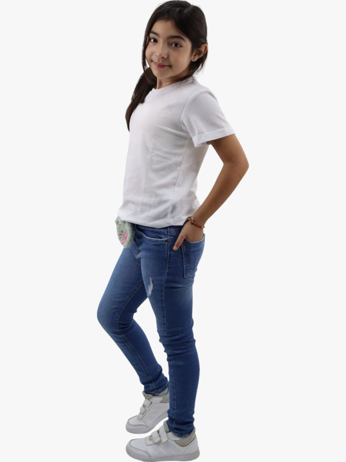 Jeans skinny de color azul medio con colgante