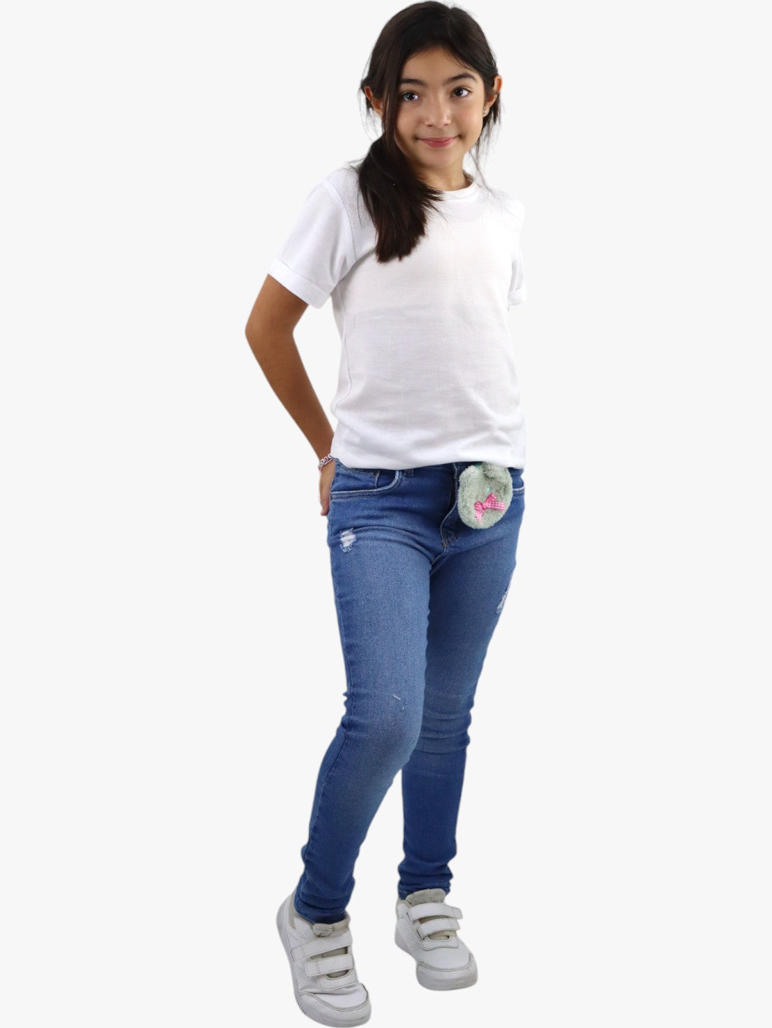 Jeans skinny de color azul medio con colgante