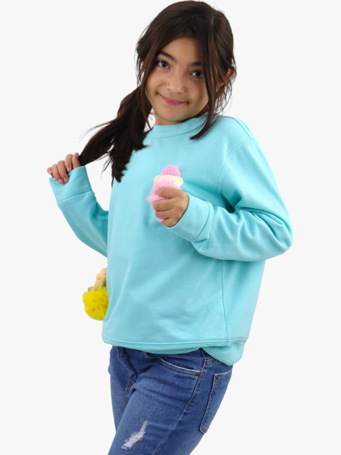 Sudadera con pompones de color azul turquesa