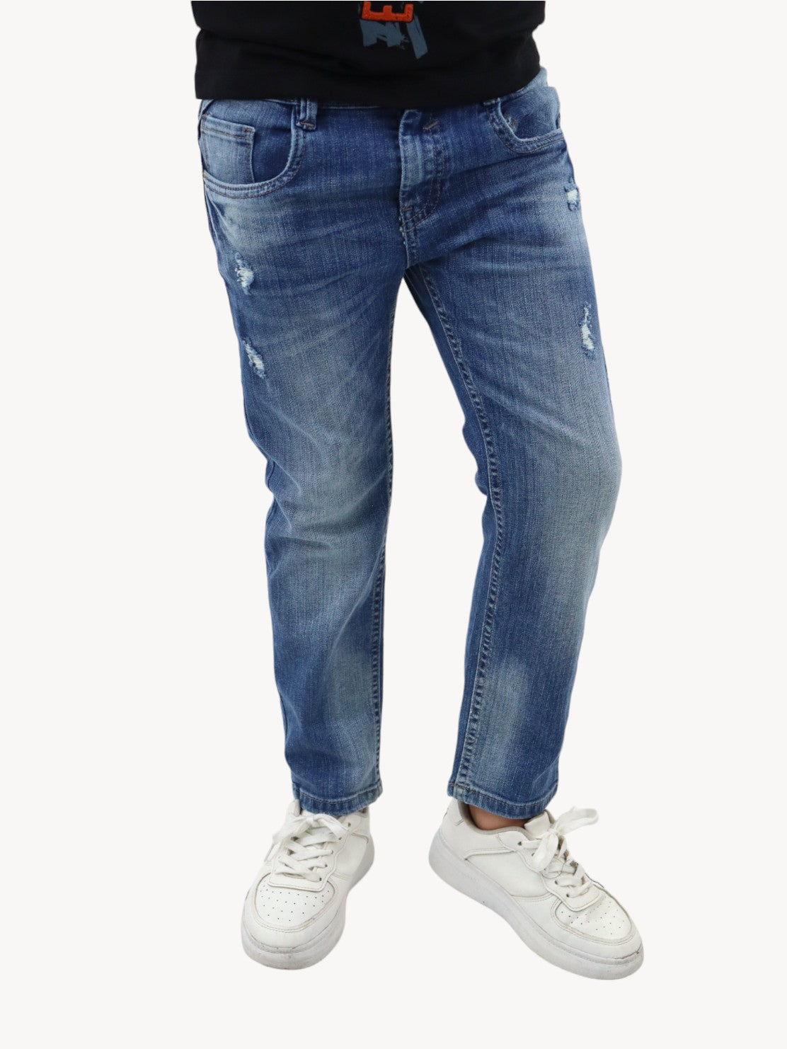 Jeans slim azul deslavado con destrucción