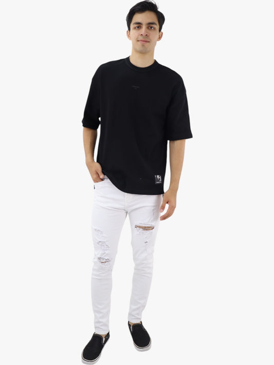 Jeans skinny blanco con destrucción