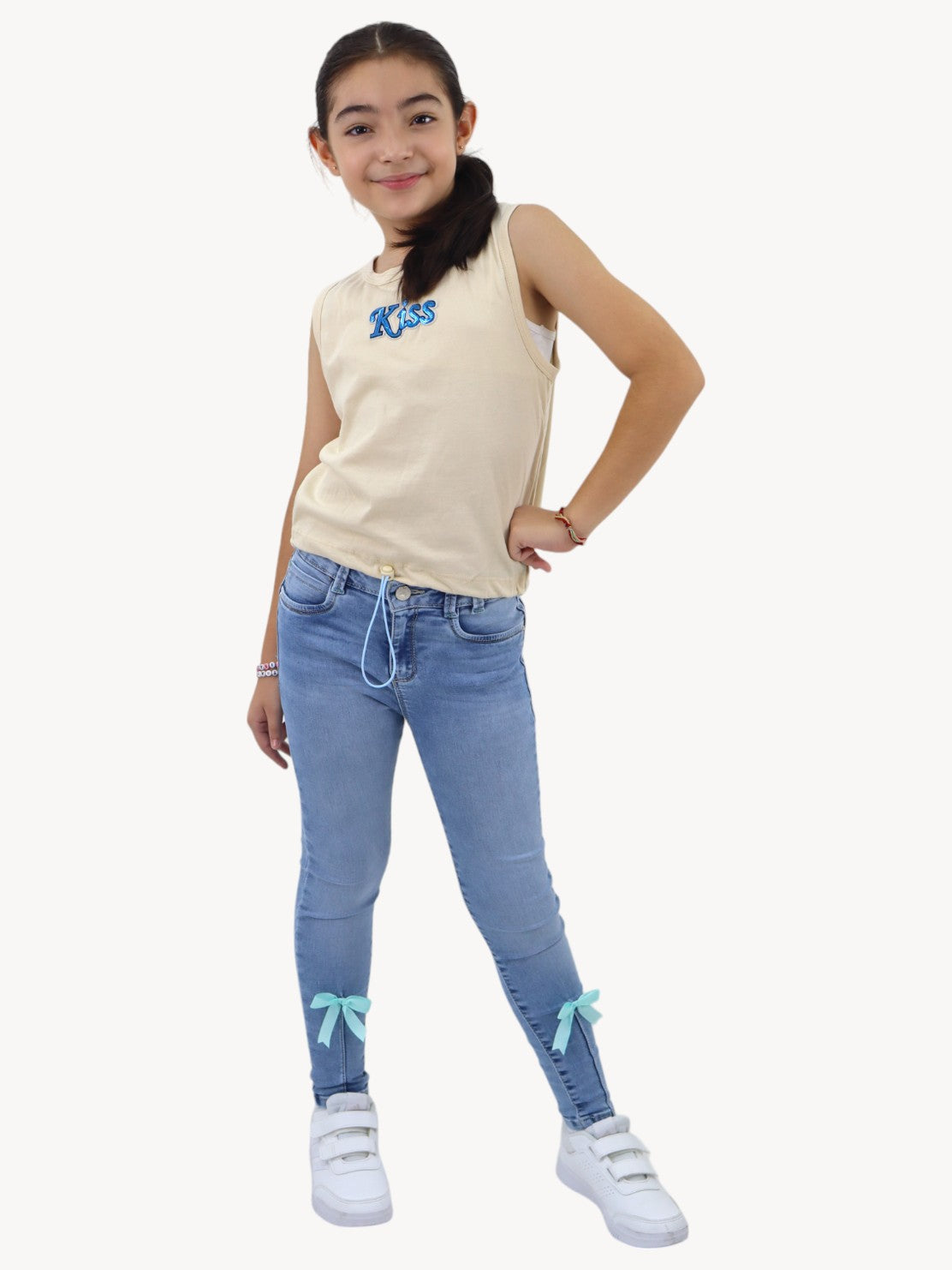 Jeans skinny con detalle de moños