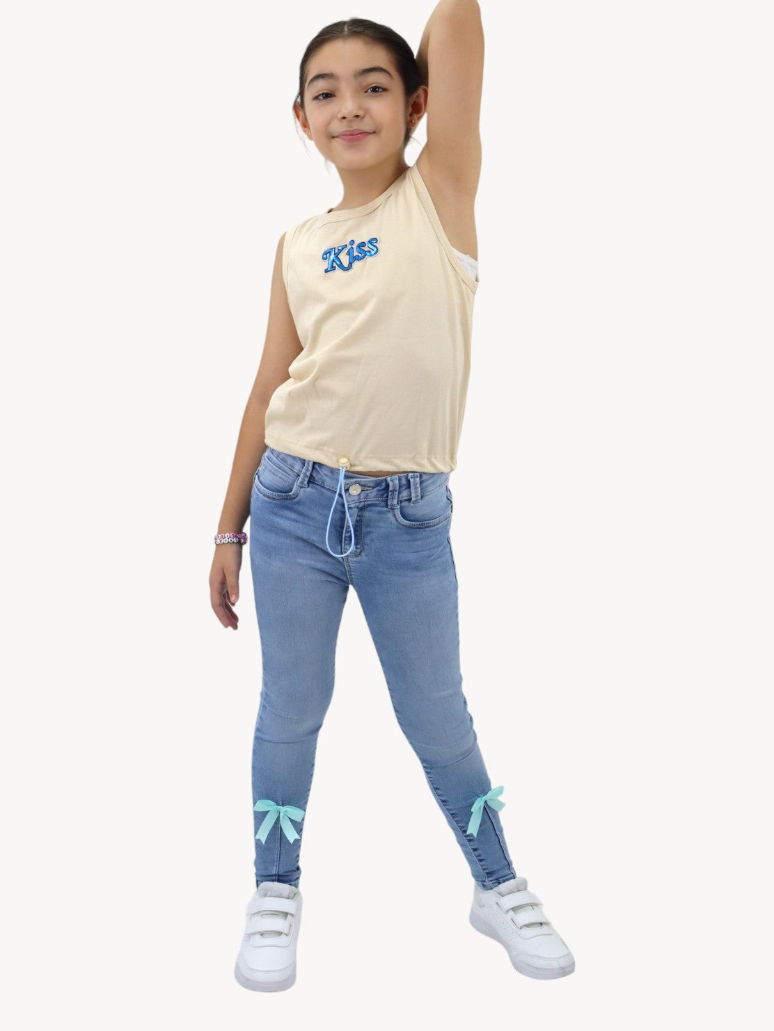 Jeans skinny con detalle de moños