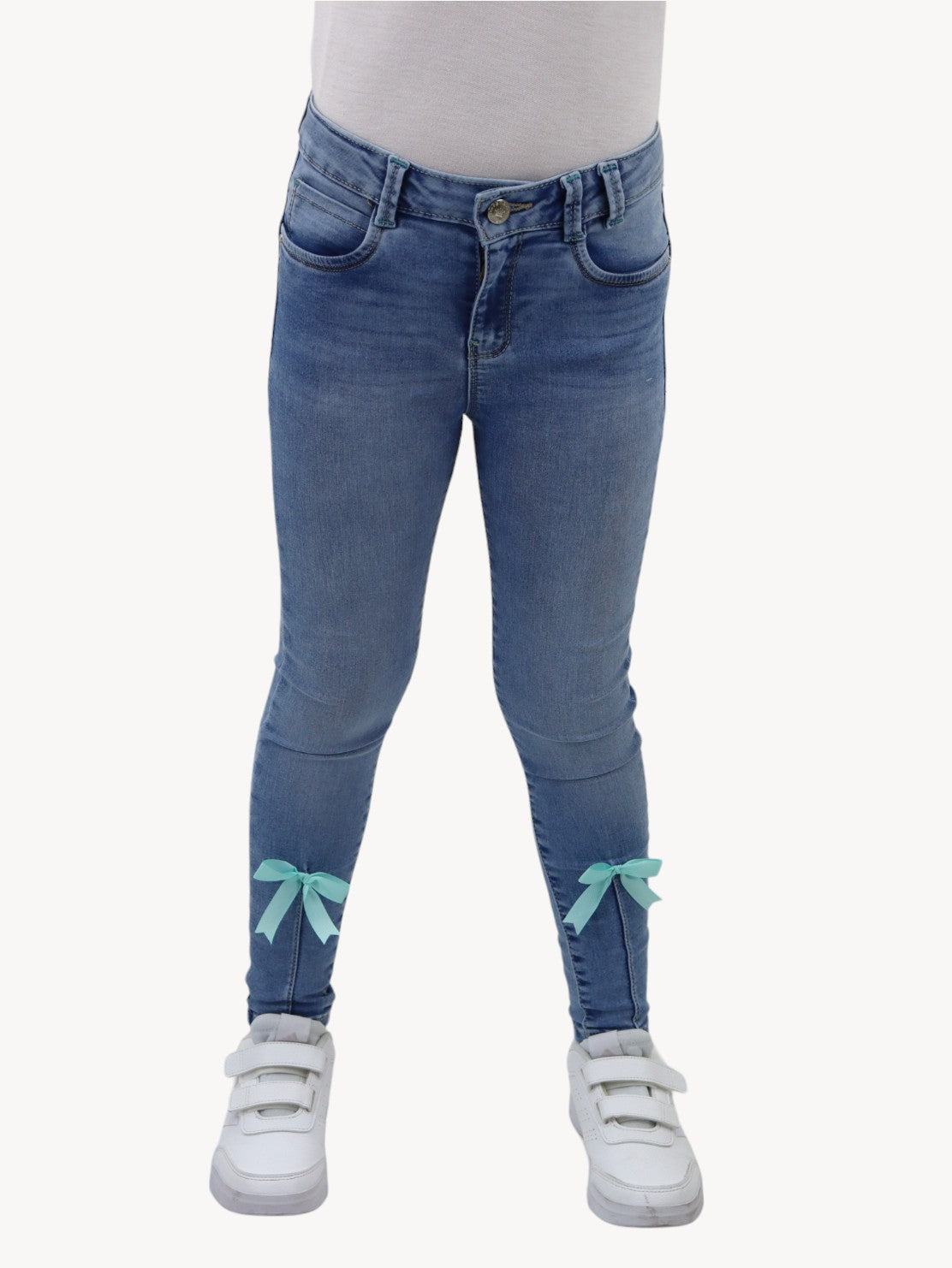 Jeans skinny con detalle de moños