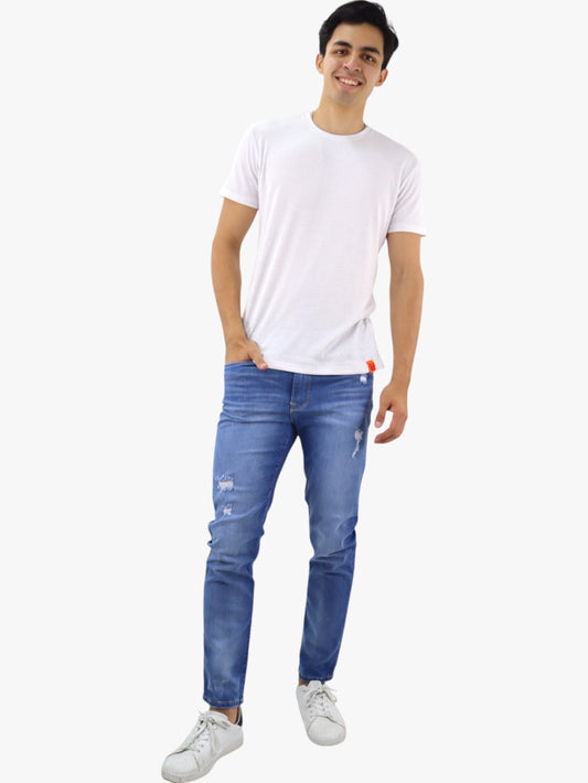 Jeans slim/skinny con destrucción