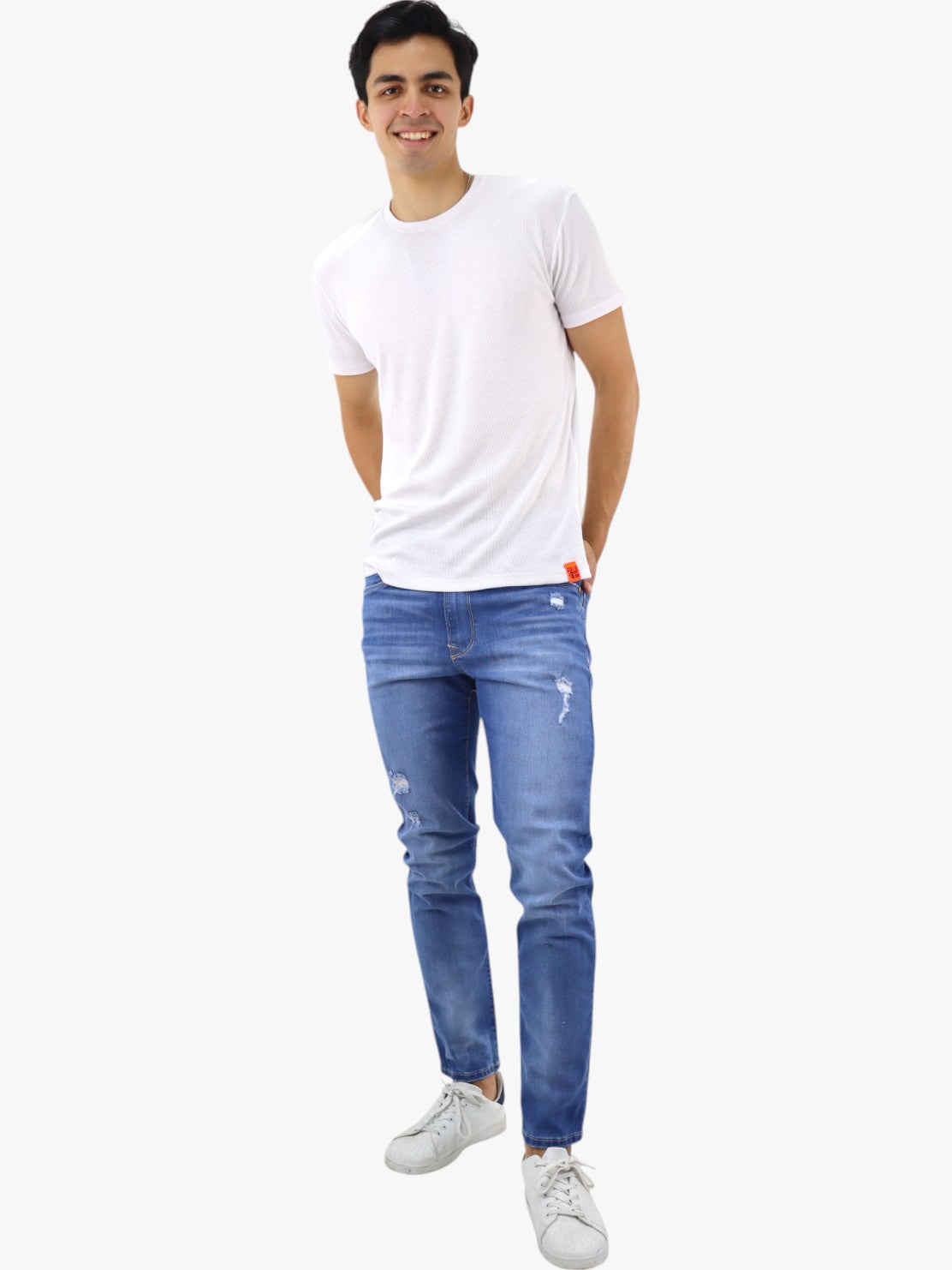 Jeans slim/skinny con destrucción