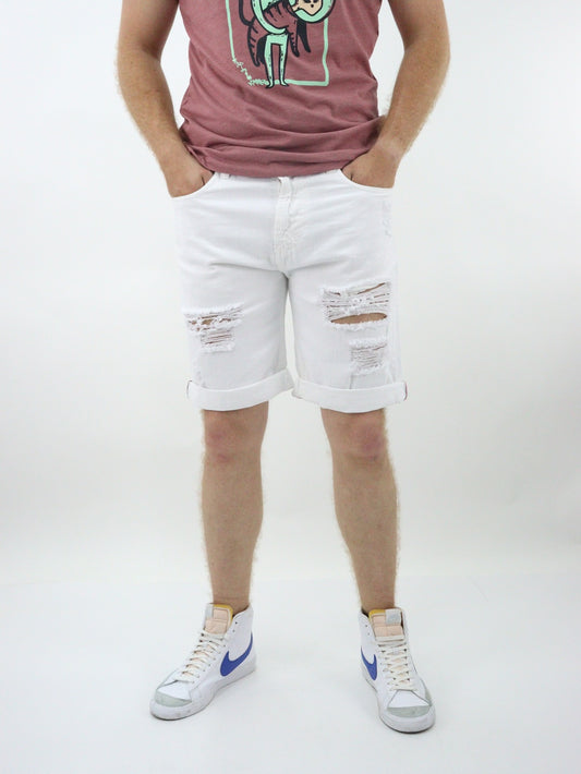 Short de color blanco con destrucción