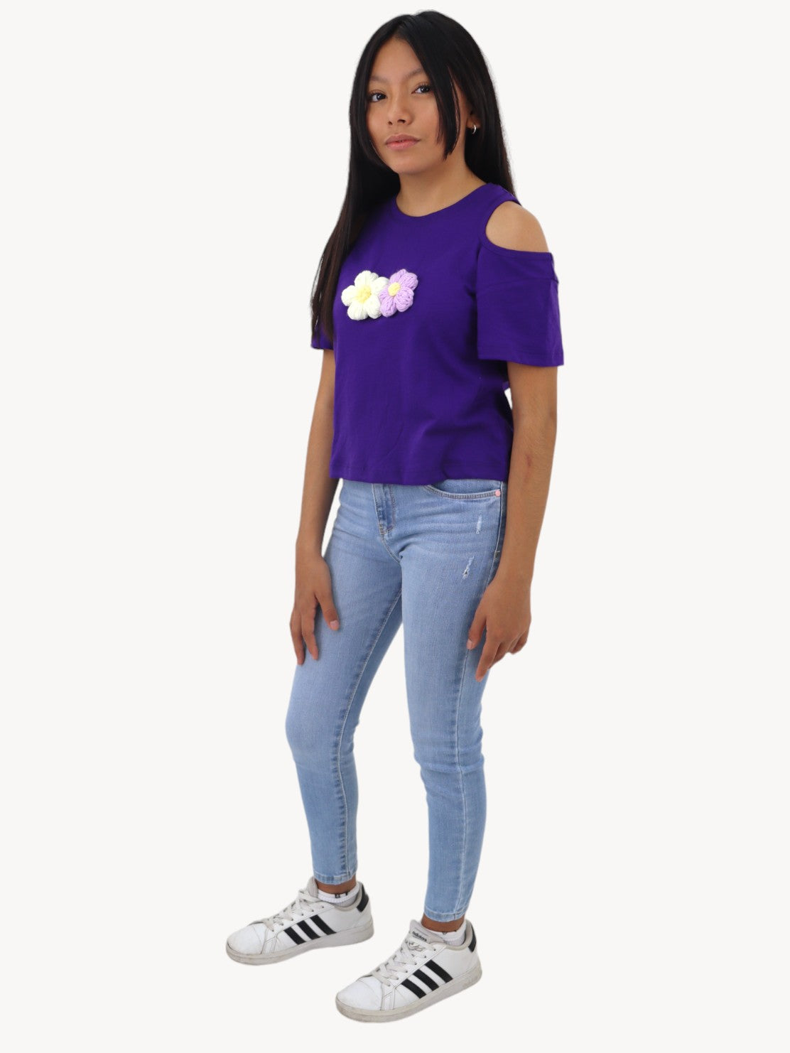 Jeans skinny con bordado floral