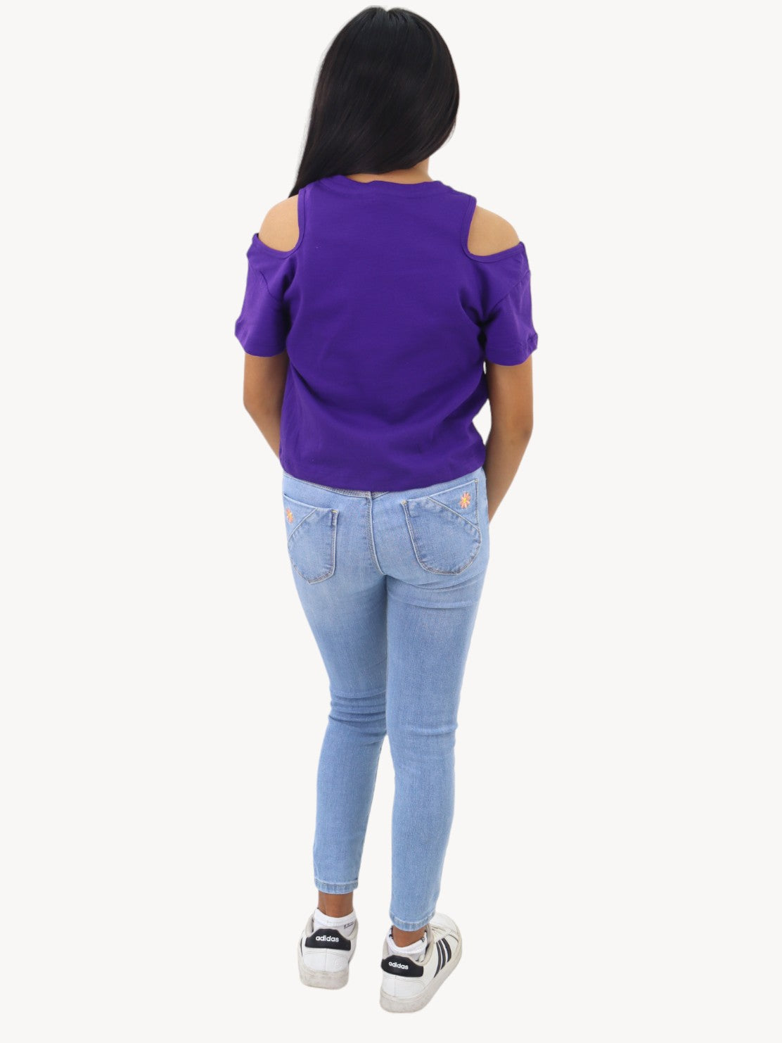 Jeans skinny con bordado floral