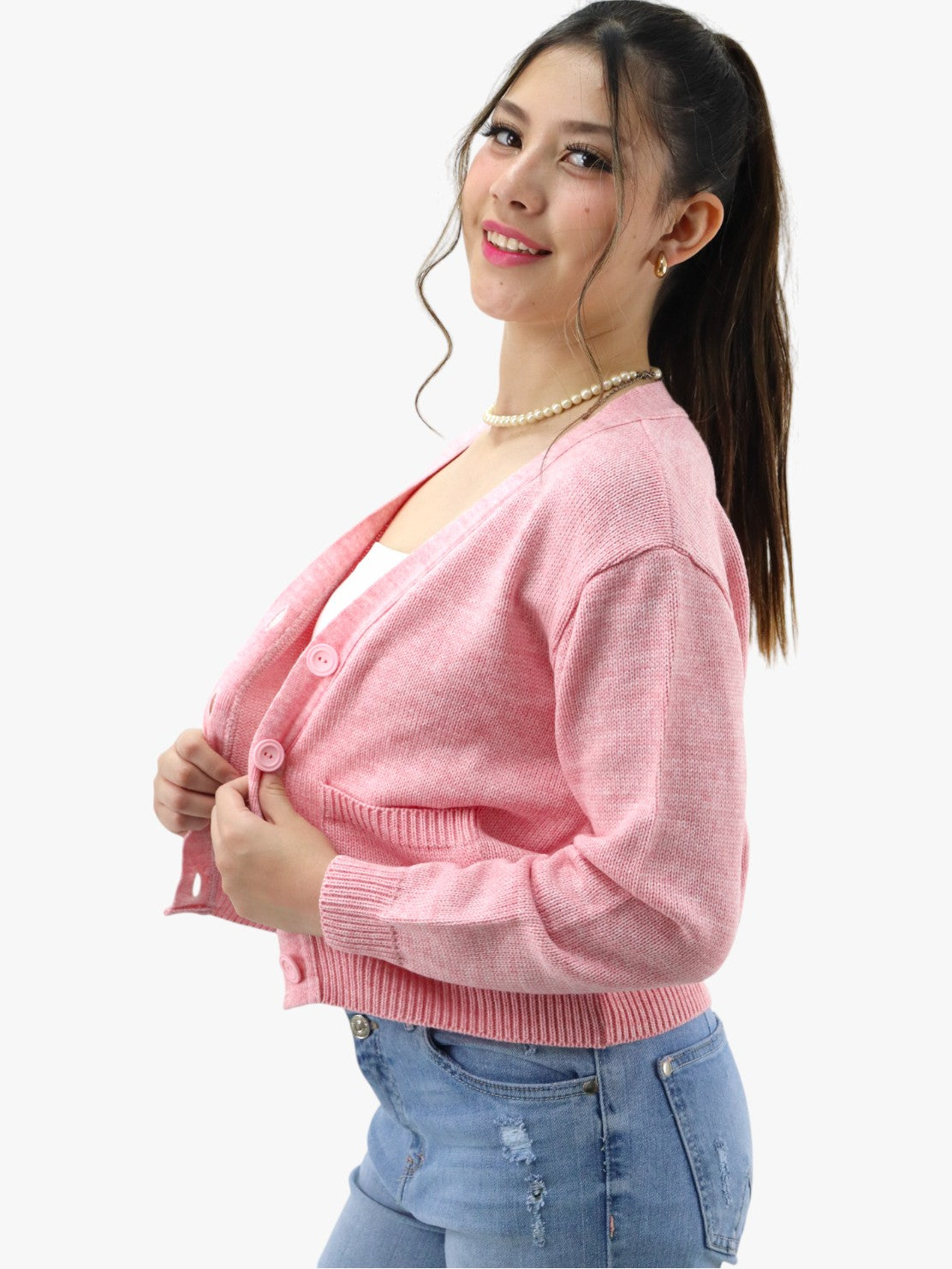 Suéter tejido con botones rosa