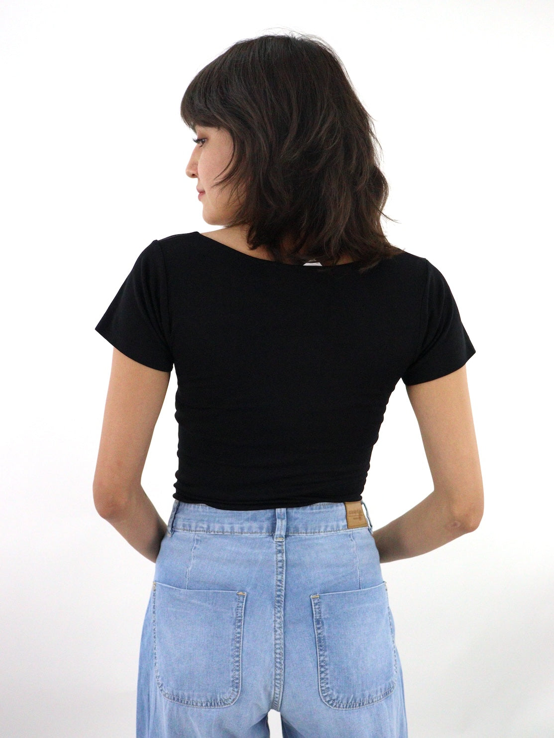 Body con mangas de color negro
