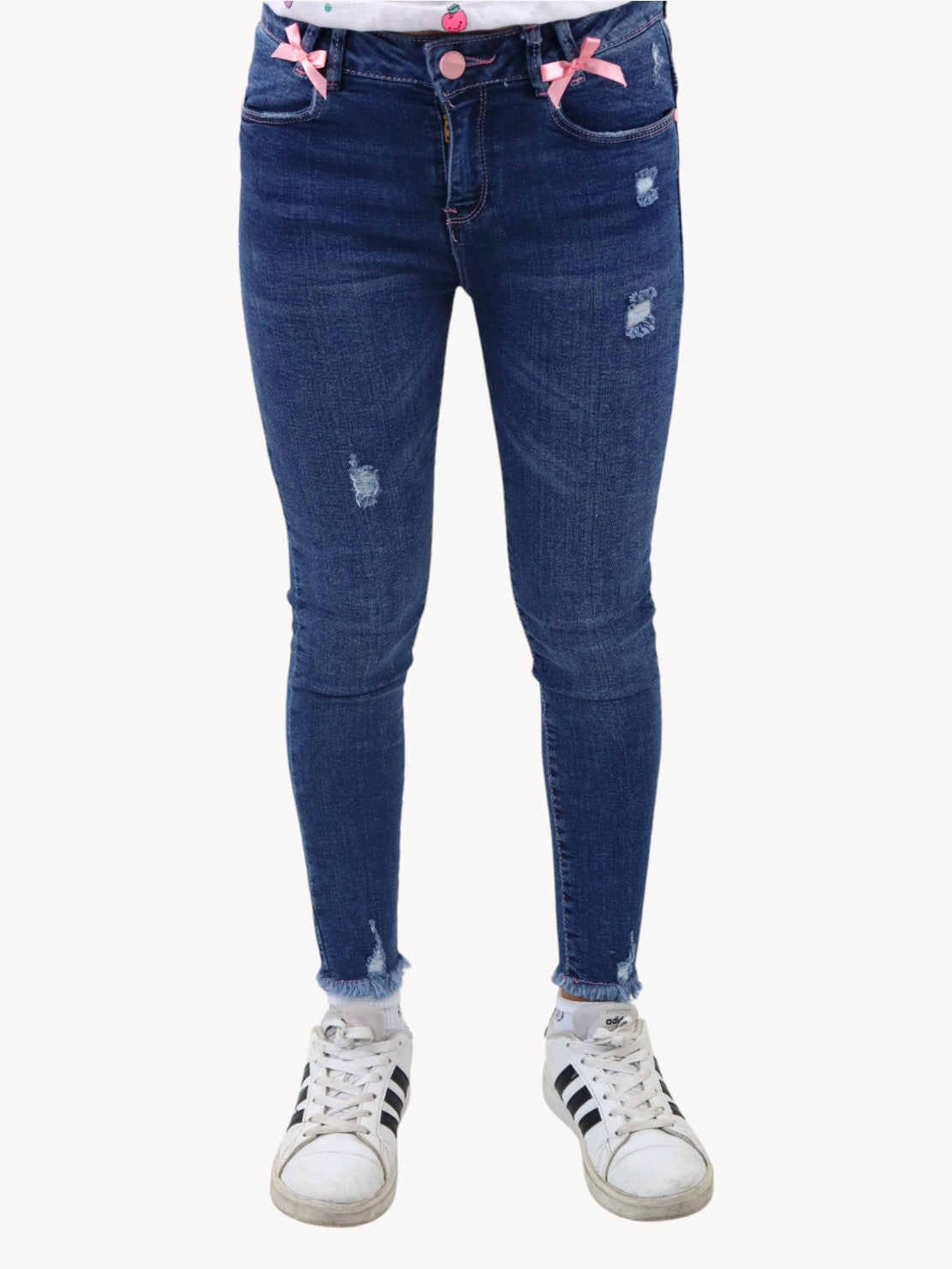 Jeans tobillero azul oscuro con destrucción