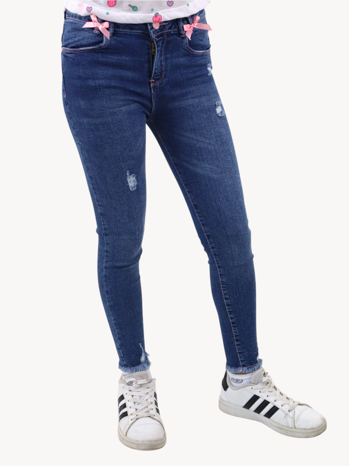 Jeans tobillero azul oscuro con destrucción