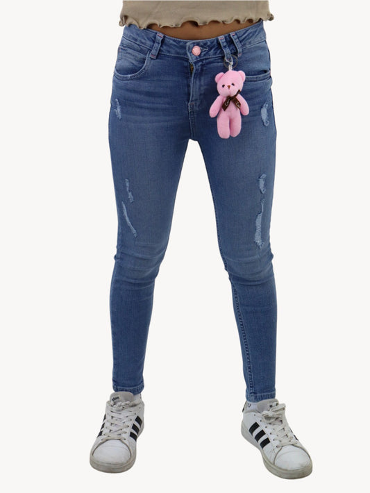 Jeans skinny con colgante decorativo