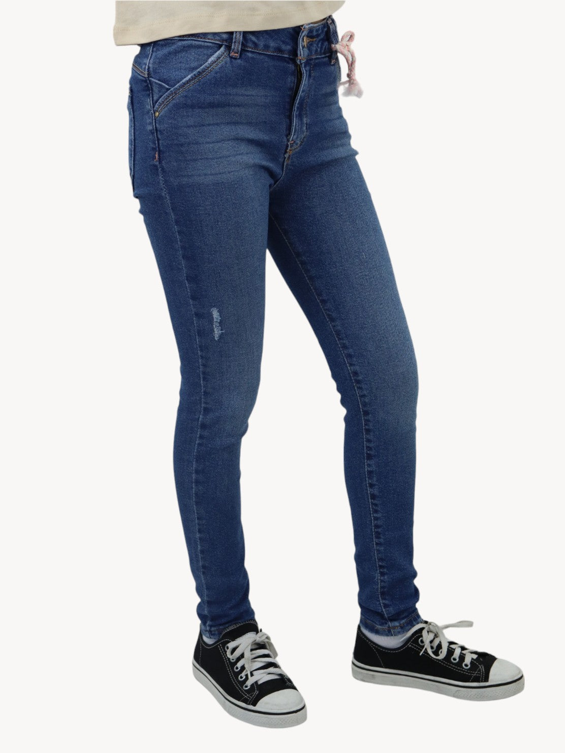 Jeans skinny azul medio con destrucción