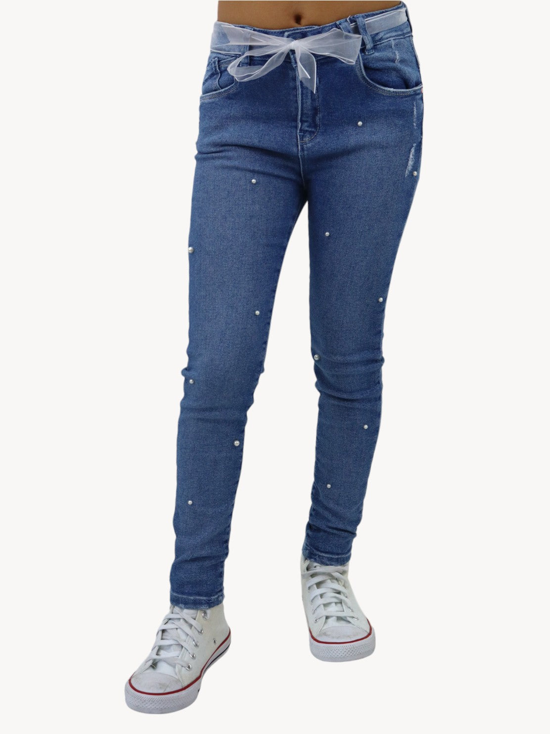 Jeans skinny con cinturón y detalle de perlas