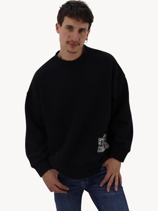 Sudadera oversize cuello redondo de color negro