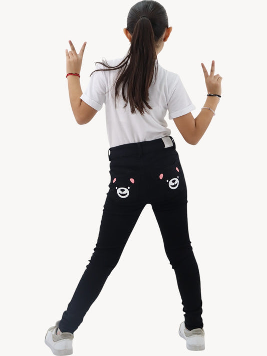 Jeans skinny negro con diseño en bolsas de oso