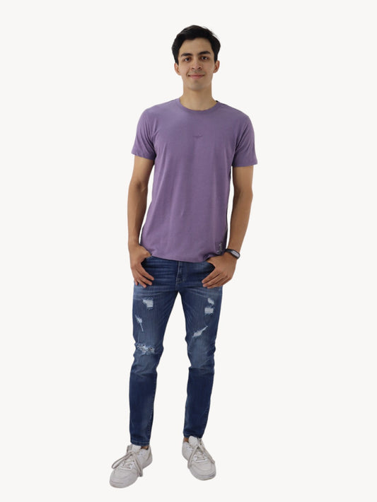 Jeans slim/skinny azul oscuro deslavado con destrucción