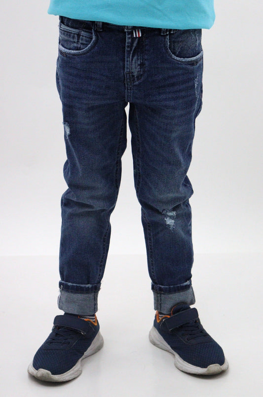 Jeans skinny de color azul oscuro con destrucción