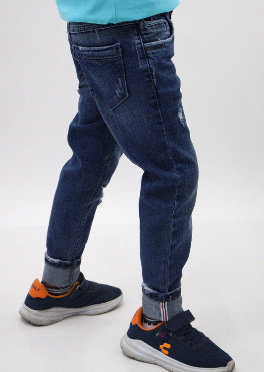 Jeans skinny de color azul oscuro con destrucción