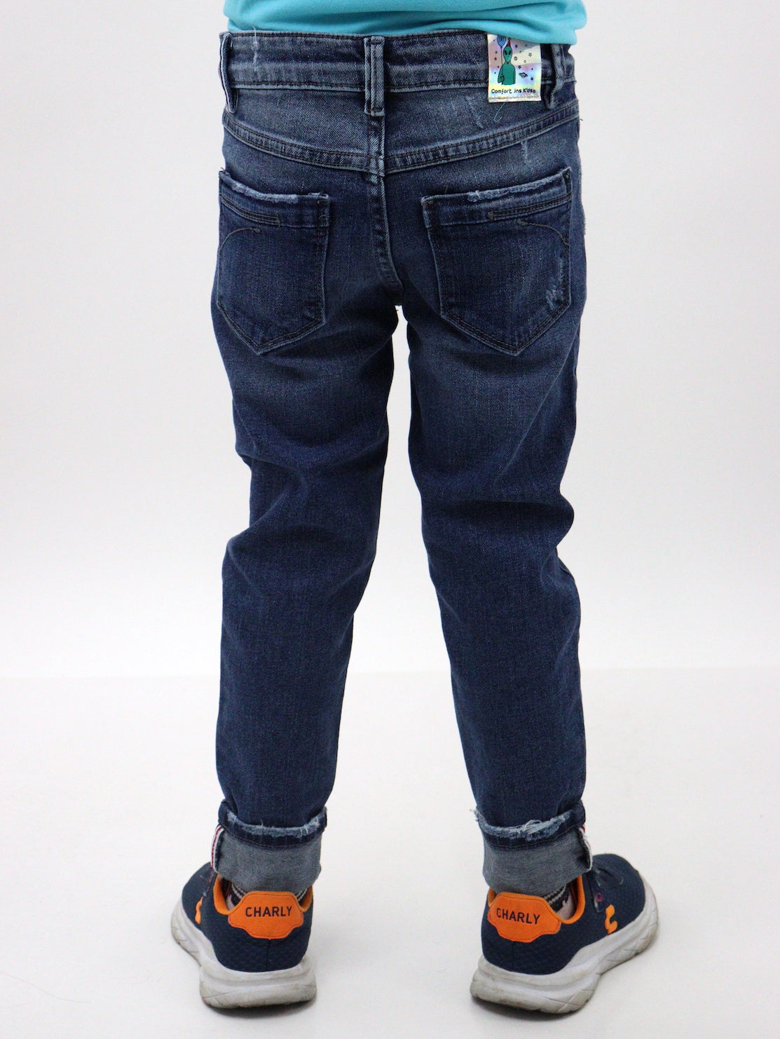 Jeans skinny de color azul oscuro con destrucción