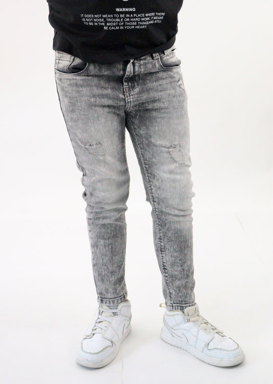 Jeans skinny de color gris con snow wash